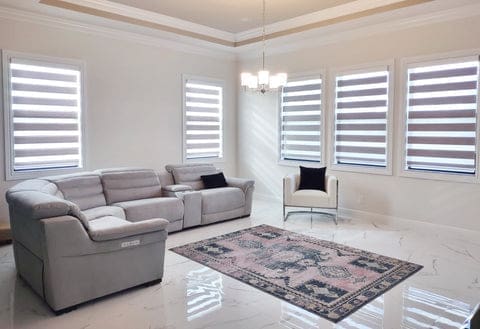 Zebra Shades installed in 5 windows in a living room