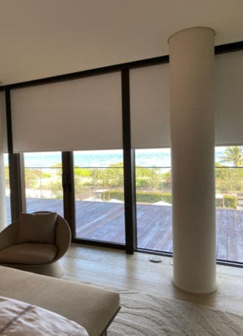 White blackout blinds with black side track