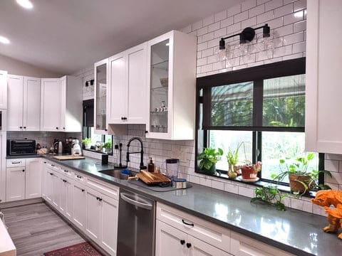 Black solar roller shades in kitchen