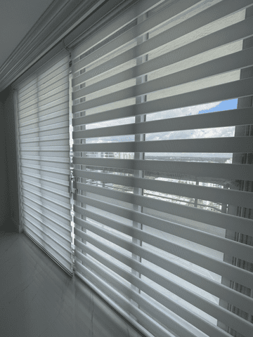 zebra shades installed on a sliding glass door