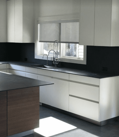 White Solar roller shades over the sink