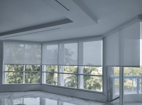 White Solar Roller Shades on sliding glass doors