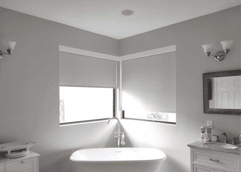 Light Grey Blackout blinds in two bathroom's windows 