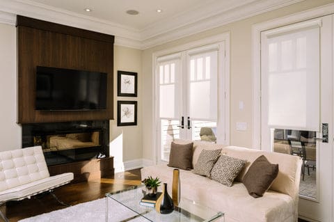 white solar shades french doors in living room