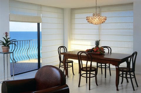 Coastal style  Window Treatments on sliding glass door. Front ocean living room
