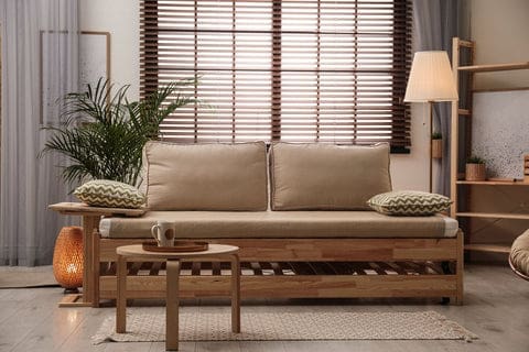 brown Faux wood blinds in minimalist living room with a brown woodewn couch