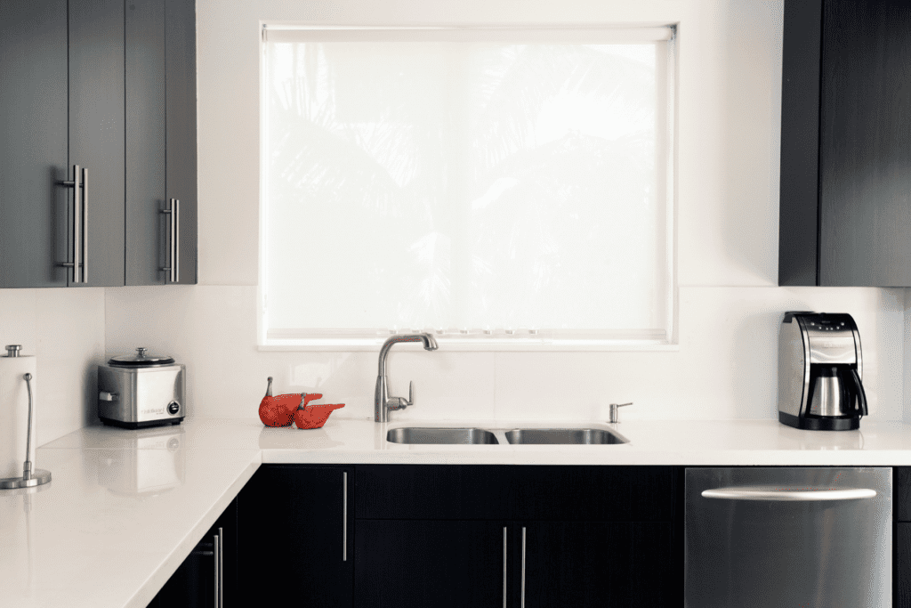 solar shades installed in a kitchen over the sink